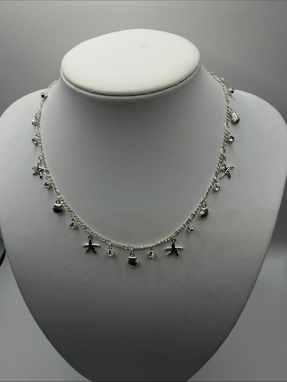 064. Silver Seashell & Starfish Charm Necklace Beach Inspired 16” - 18”